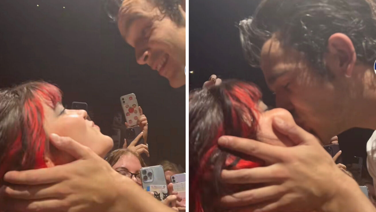 Matt Healy kissing a fan on tour.