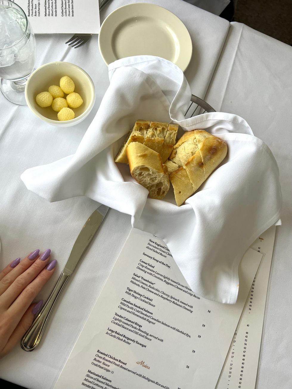 Menu with bread and butter.