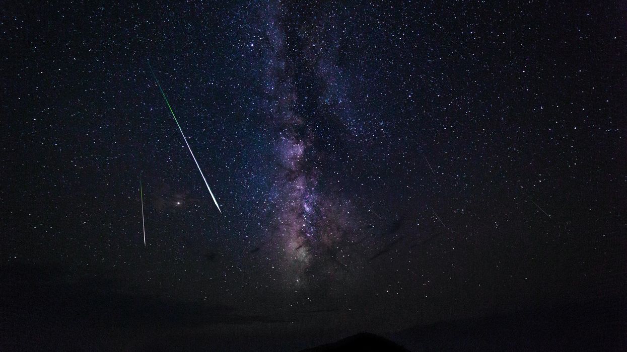 Meteors in a starry sky.