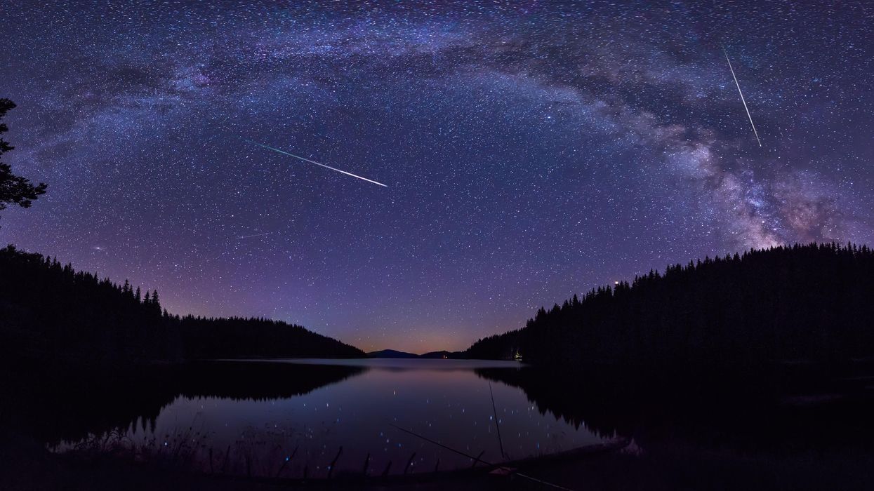 Meteors in the night sky.