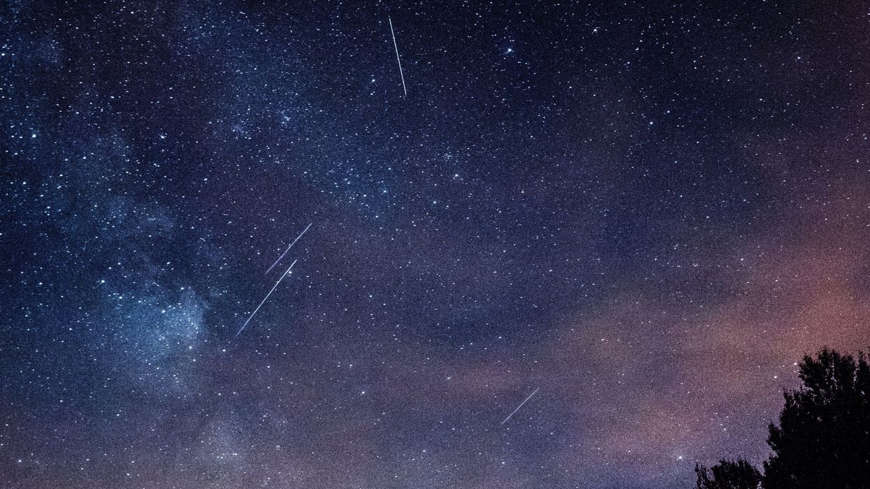 Meteors in the night sky.