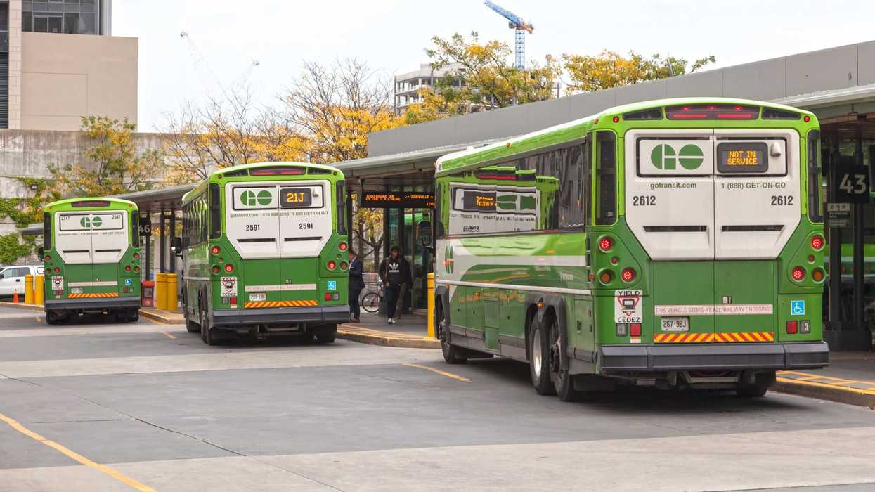 metrolinx go transit buses at station in toronto