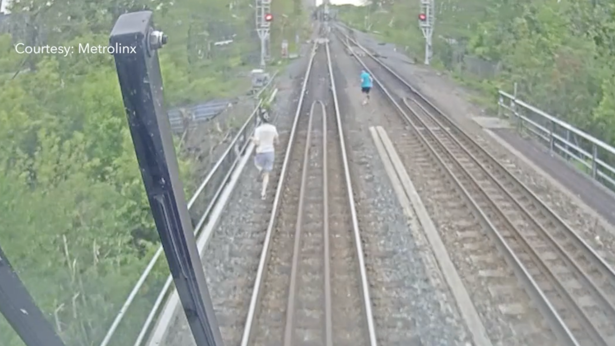 Metrolinx's video of the three people on the train tracks.