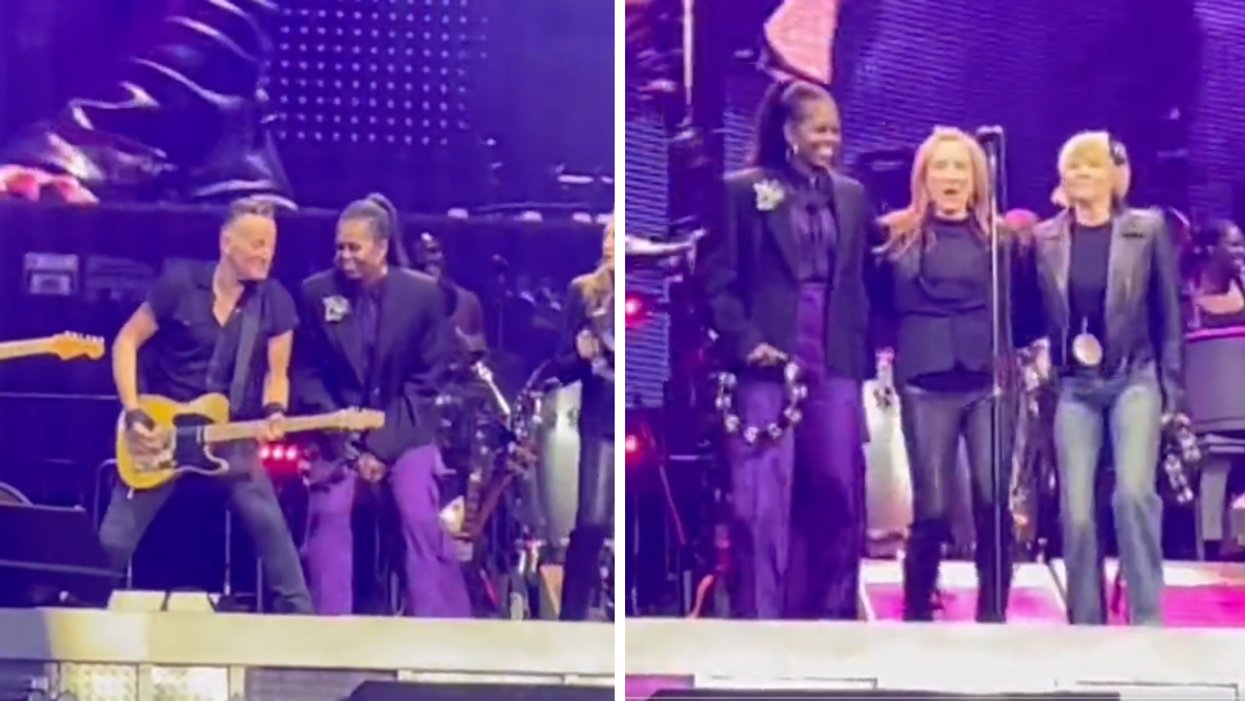 Michelle Obama on stage with Bruce Springsteen.