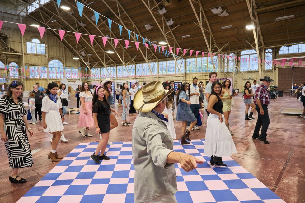 MilkUP guests enjoying the line dancing at Cownty Fair.