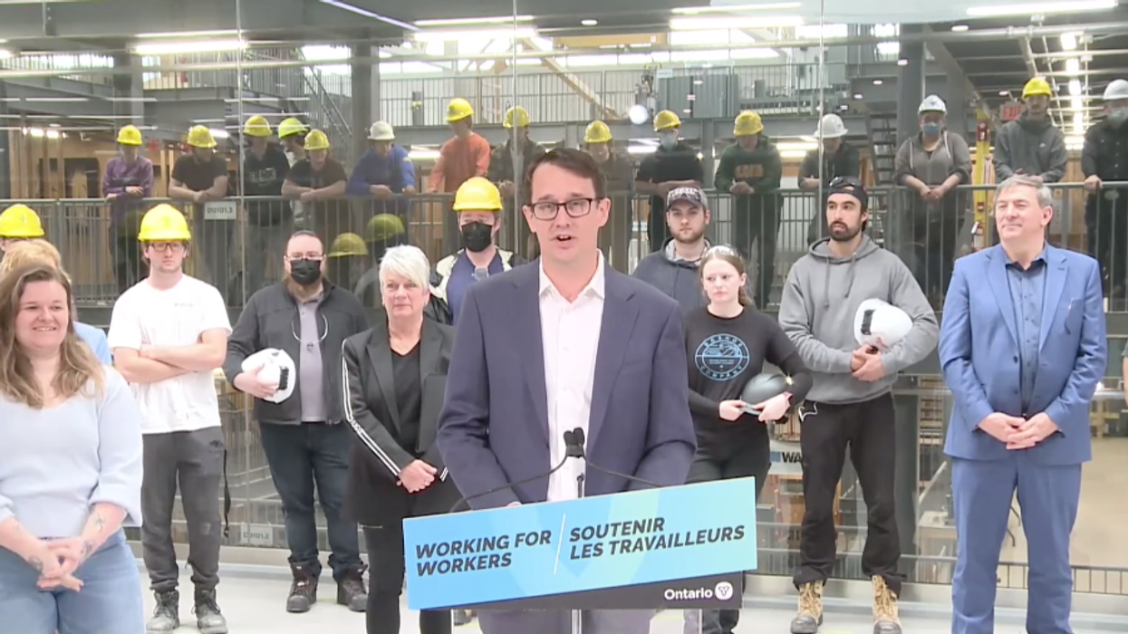 Monte McNaughton making an announcement.