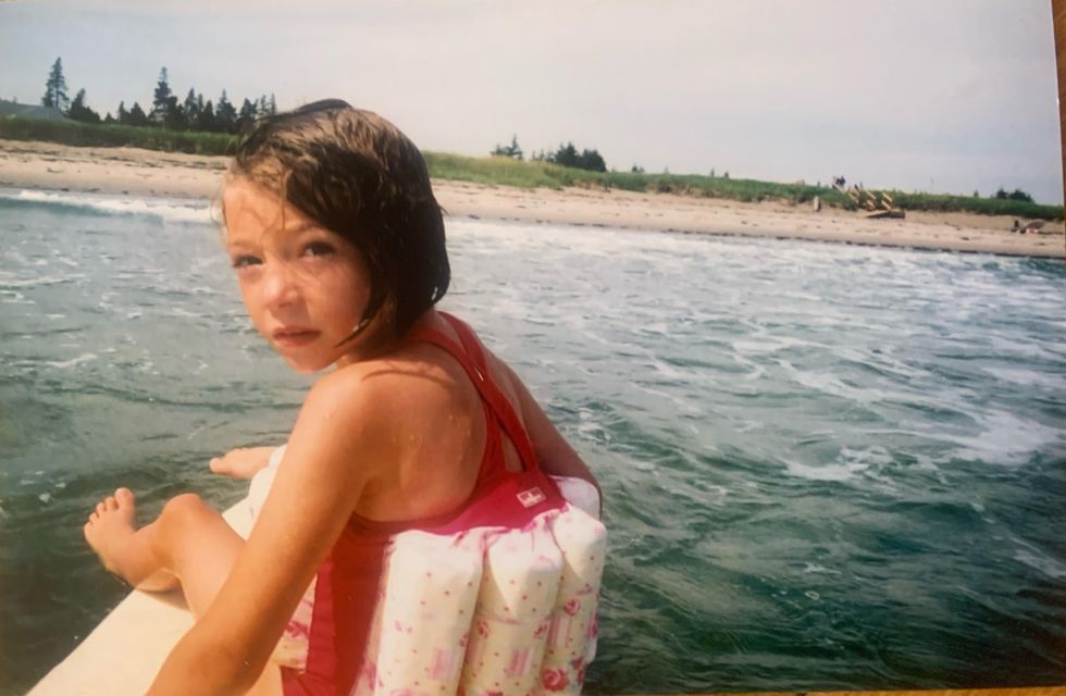 Morgan Leet as a kid surfing in Nova Scotia.