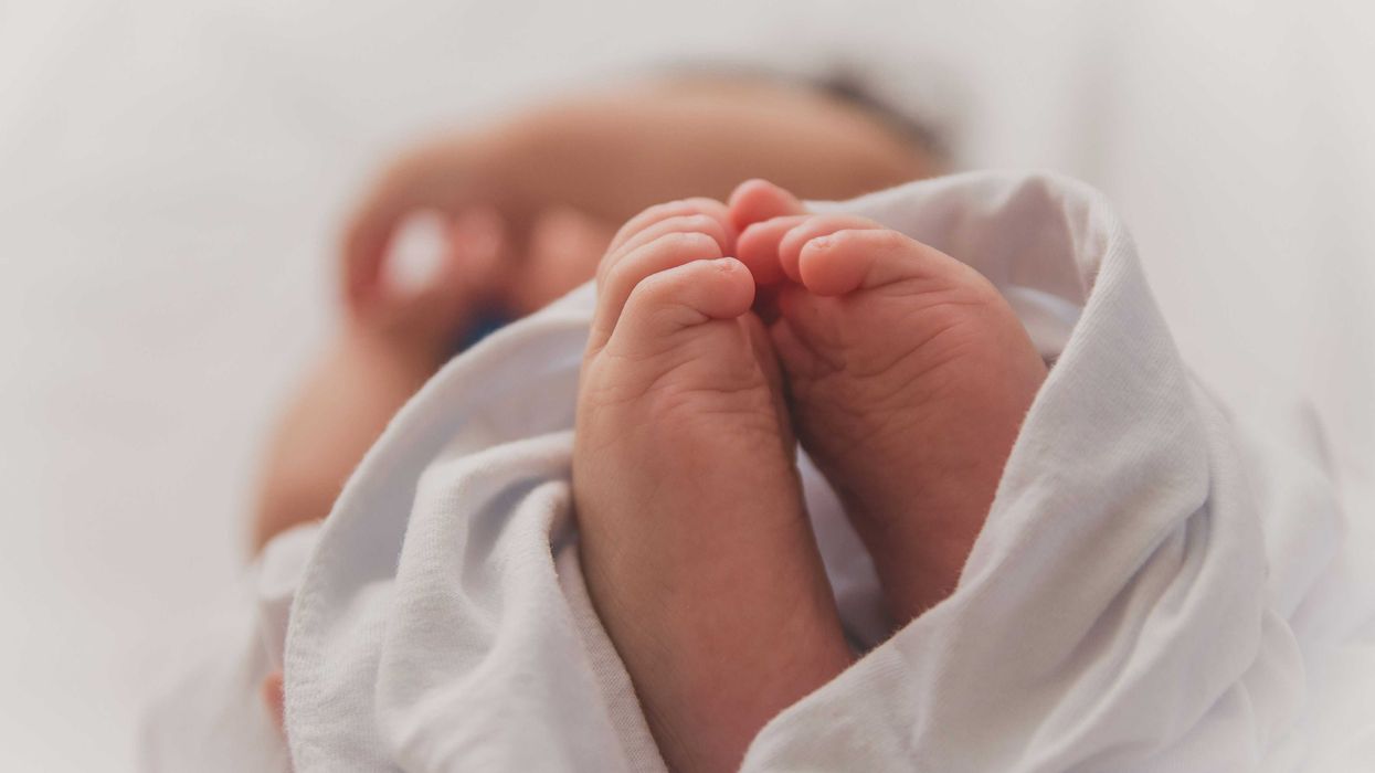 newborn baby wrapped in a blanket