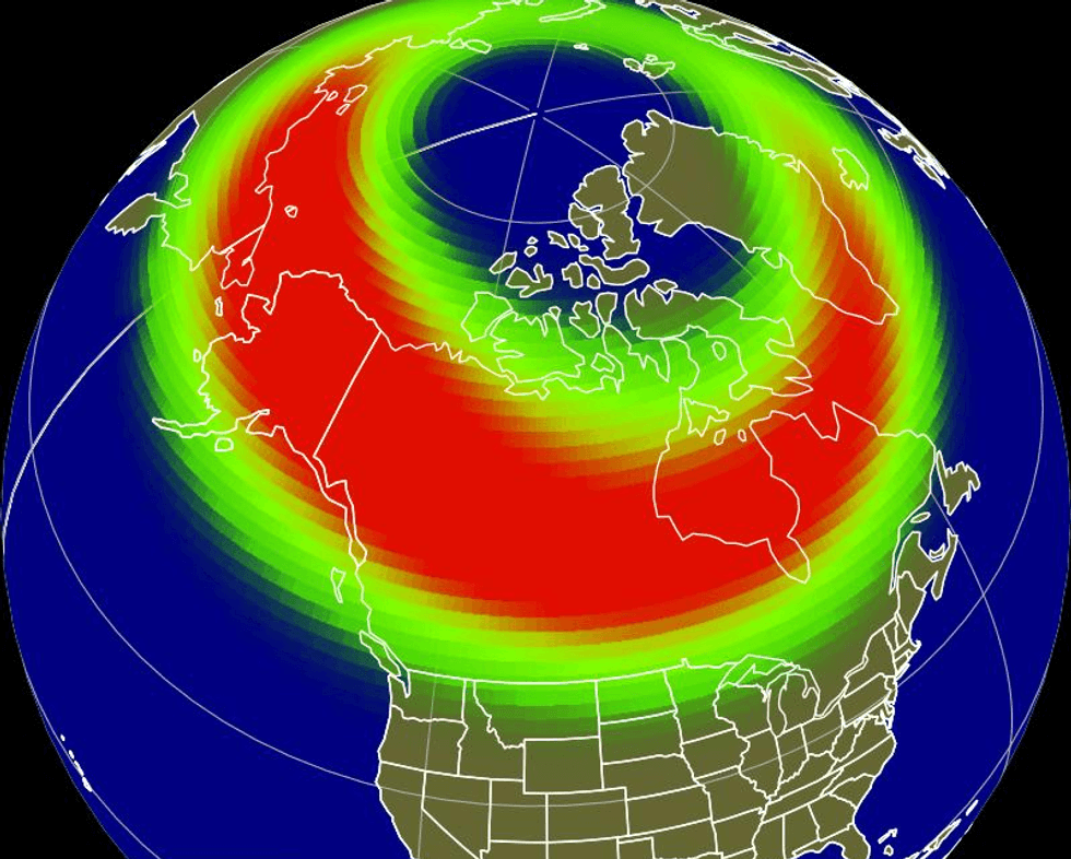 northern lights forecast map of canada with green and red auroral oval