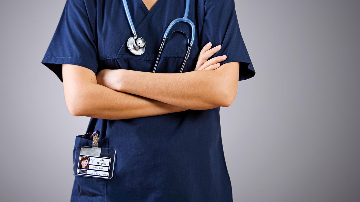 Nurse with their arms crossed.