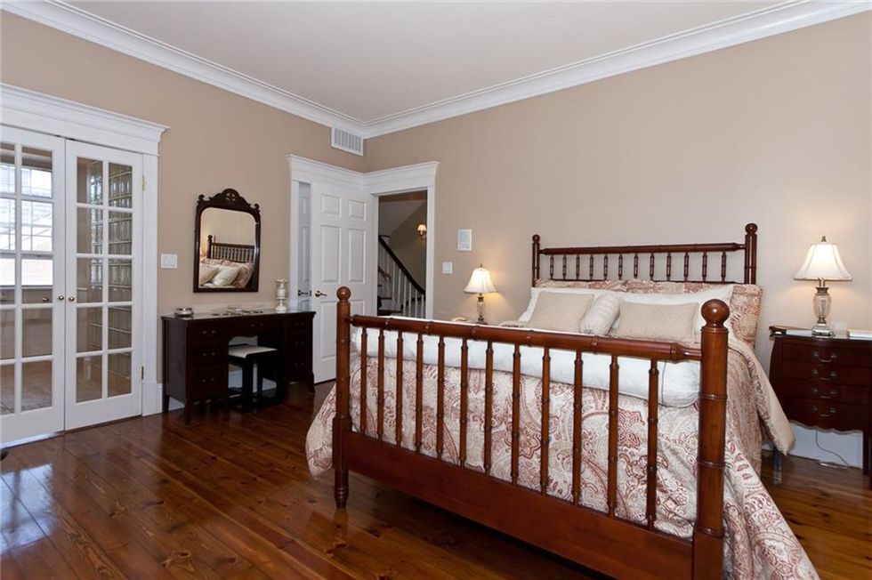 One of nine bedrooms in historic bed and breakfast for sale.