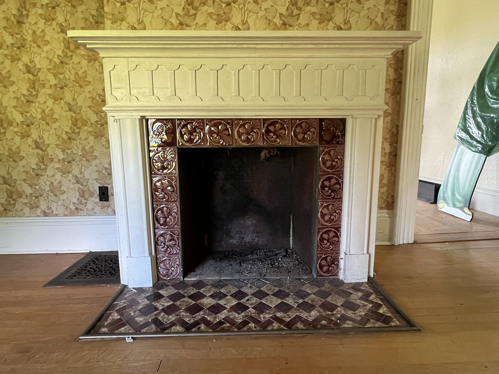 One of the fireplaces inside the house.