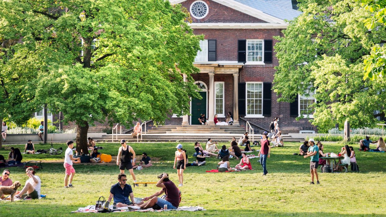 Ontonians enjoying sunny weather in Grange Park in downtown Toronto.