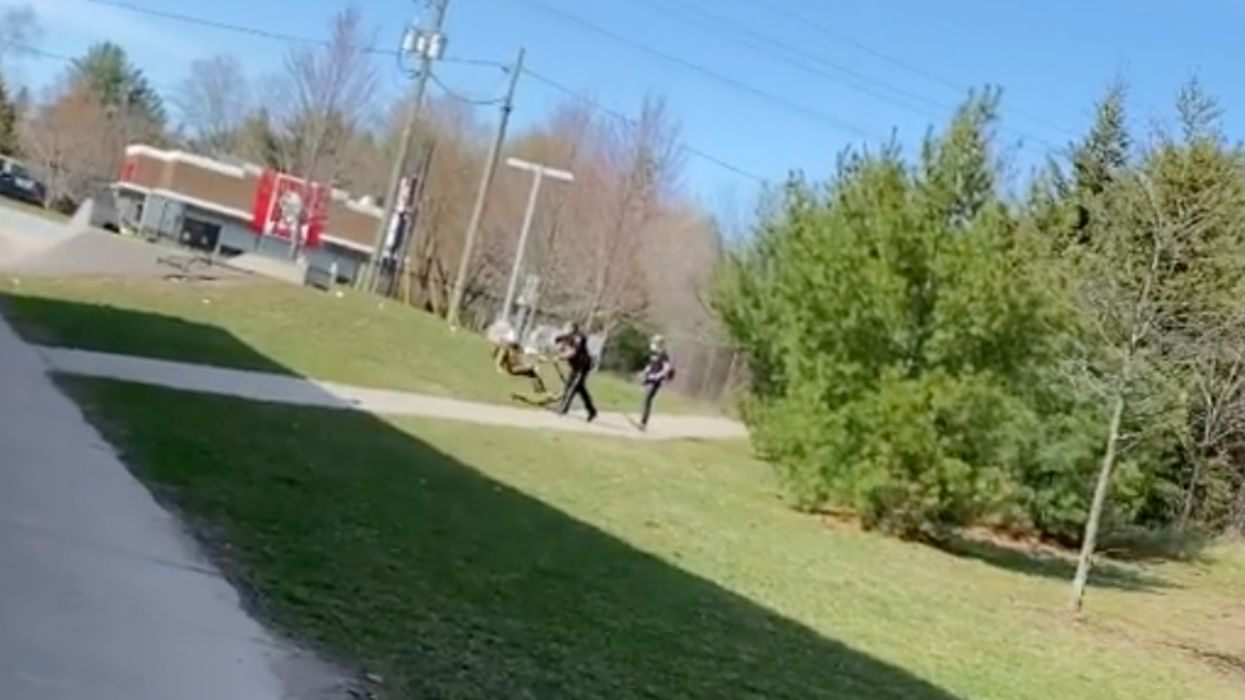OPP Officer Filmed 'Harassing & Assaulting' A Kid On A Scooter (VIDEO)
