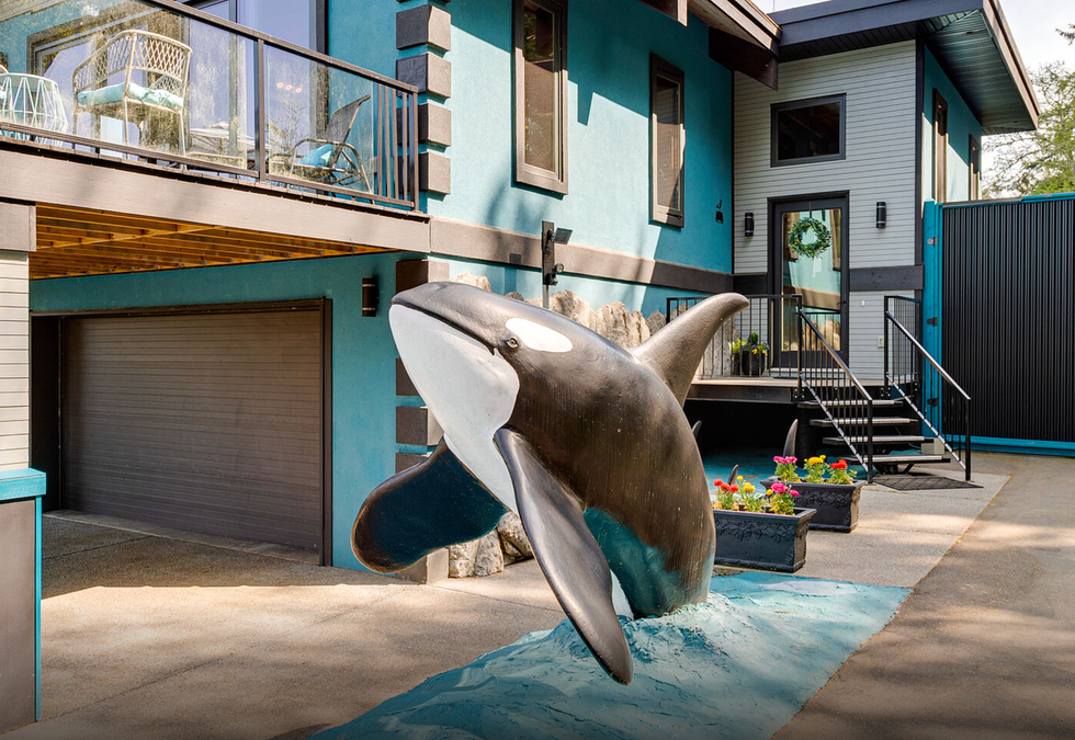 Orca statue at the front of the home.