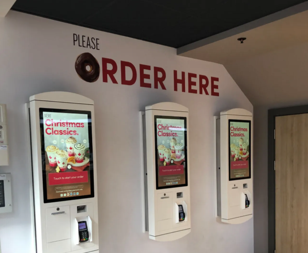 Order kiosks at a Tim Hortons in England.