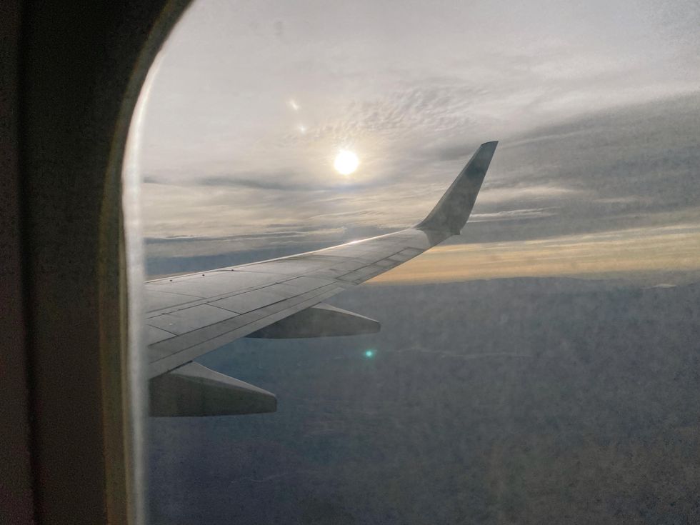 Outside a plane window.