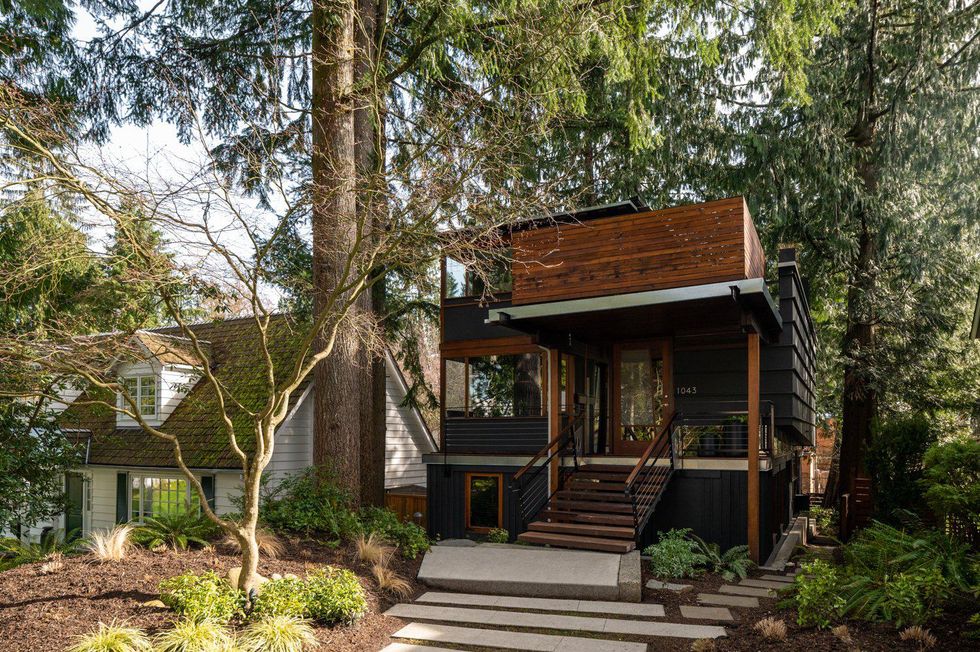 Outside of the house.