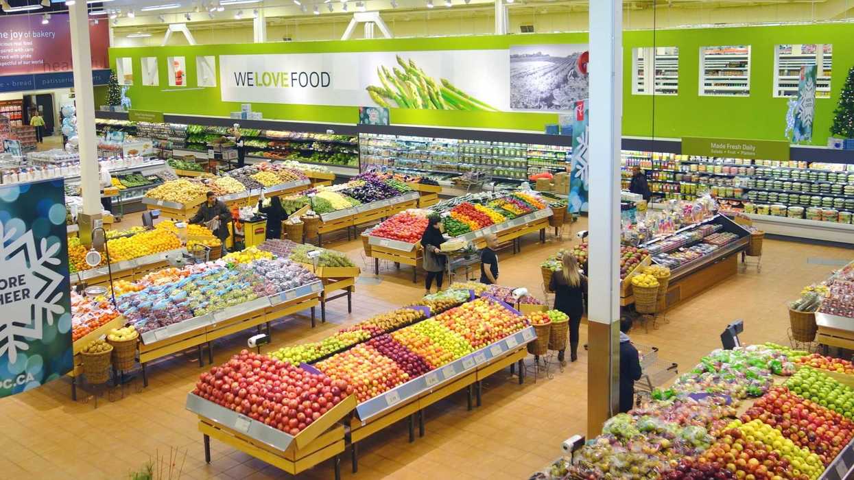overhead view of produce section at grocery store in canada