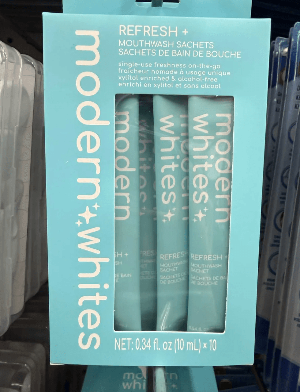 Pack of Modern Whites mint mouthwash sachets, 10 single-use, 0.34 fl oz each.
