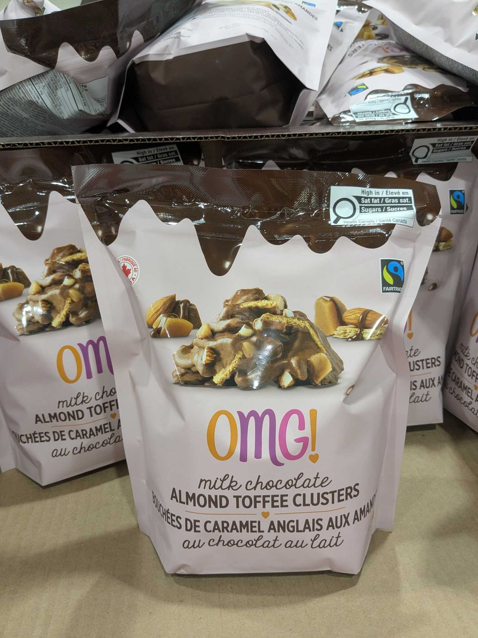 Package of OMG! chocolate clusters on a shelf at Costco