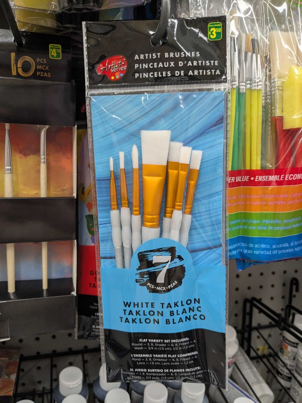 Package of paintbrushes hanging on a shelf in Dollarama