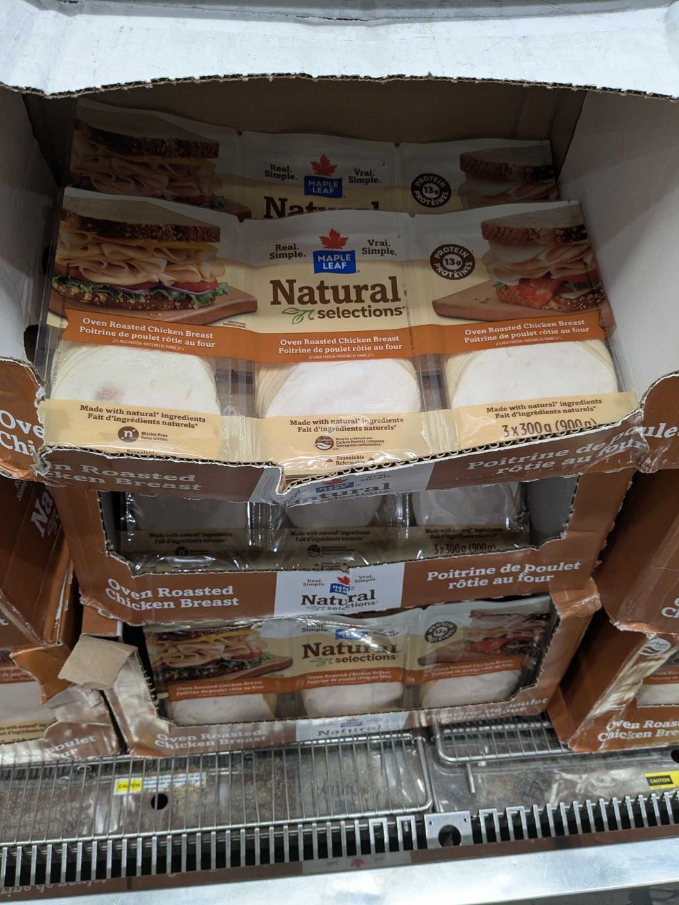 Packages of Costco luncheon meats in a fridge