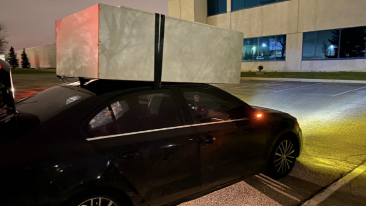 Peel Police Just Caught Someone Driving With A Dresser Taped To The Top Of Their Car