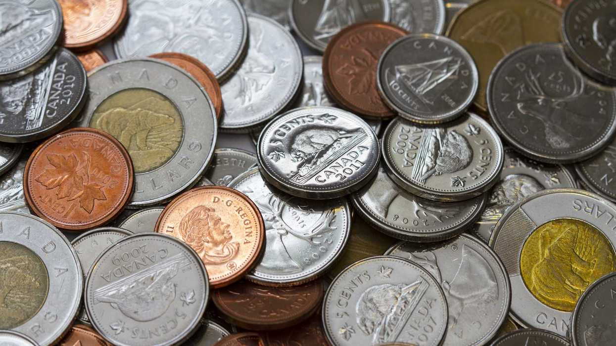 pennies in a pile of canadian coins