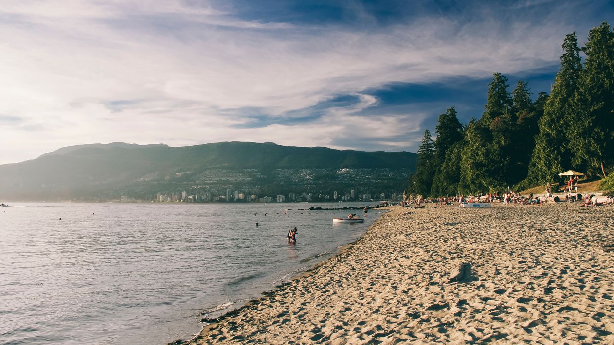 people at a beach in vancouver bc