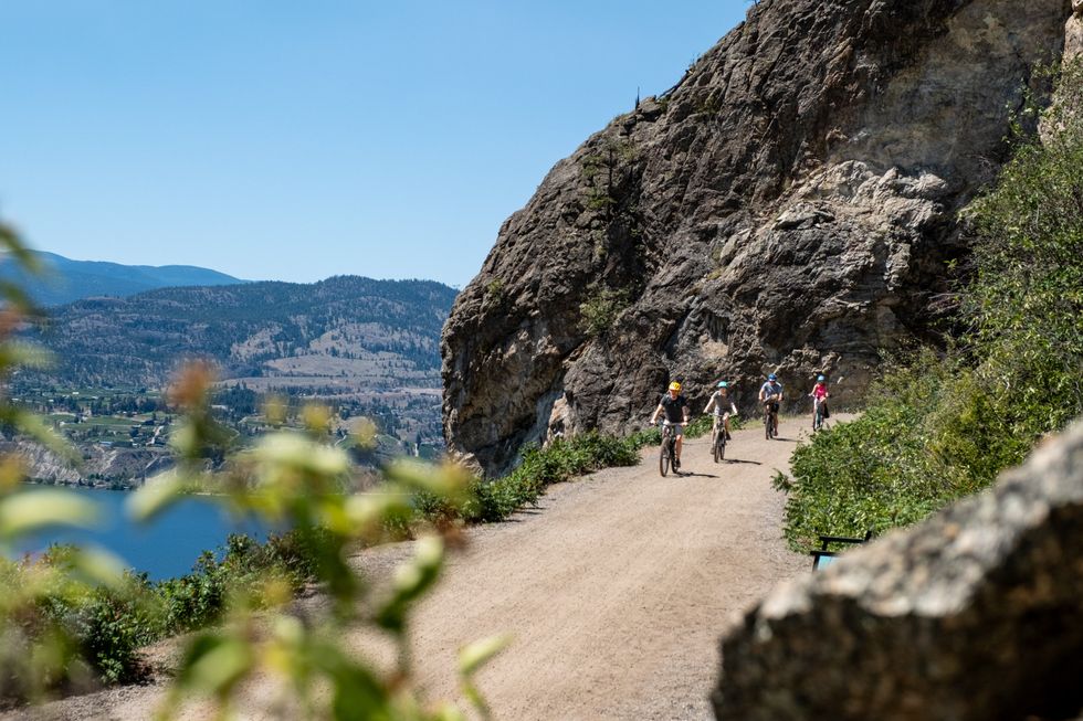 People biking the Okanagan Trestle Tour.