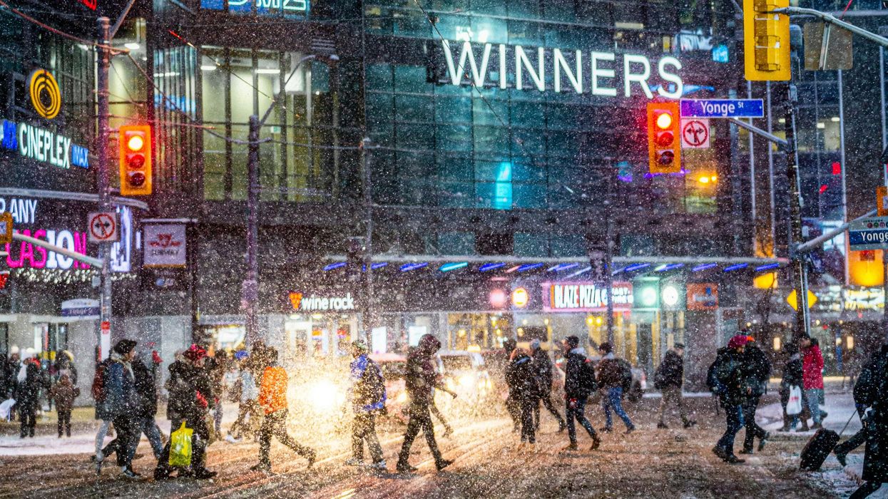 people crossing a toronto street