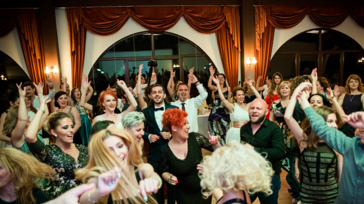 People dancing at a wedding.