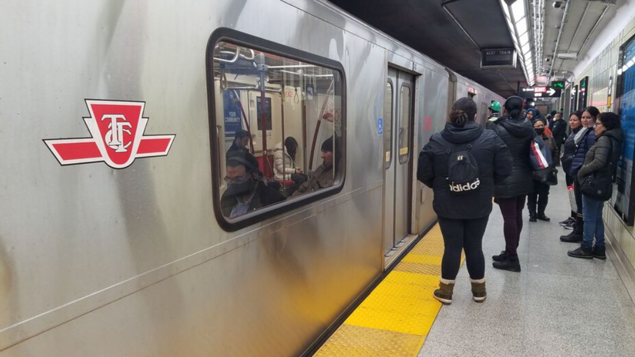 People getting on the TTC.