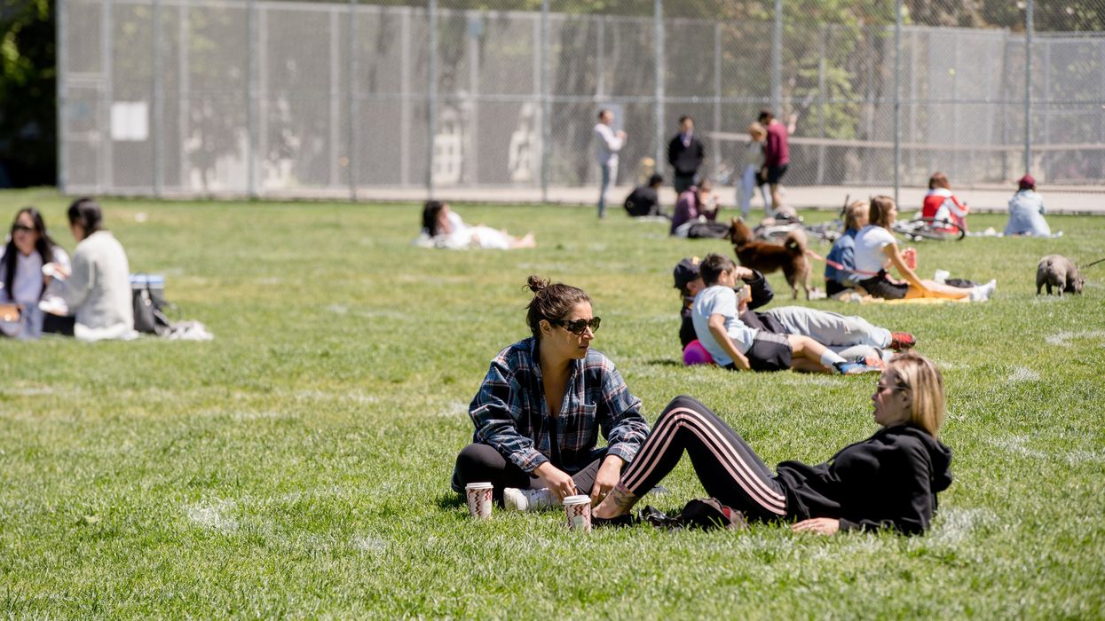 People in Trinity Bellwoods Park in Toronto.