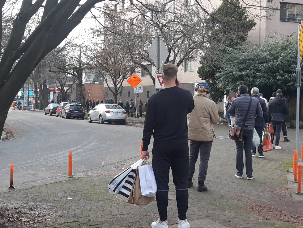 People lining up patiently in Vancouver.