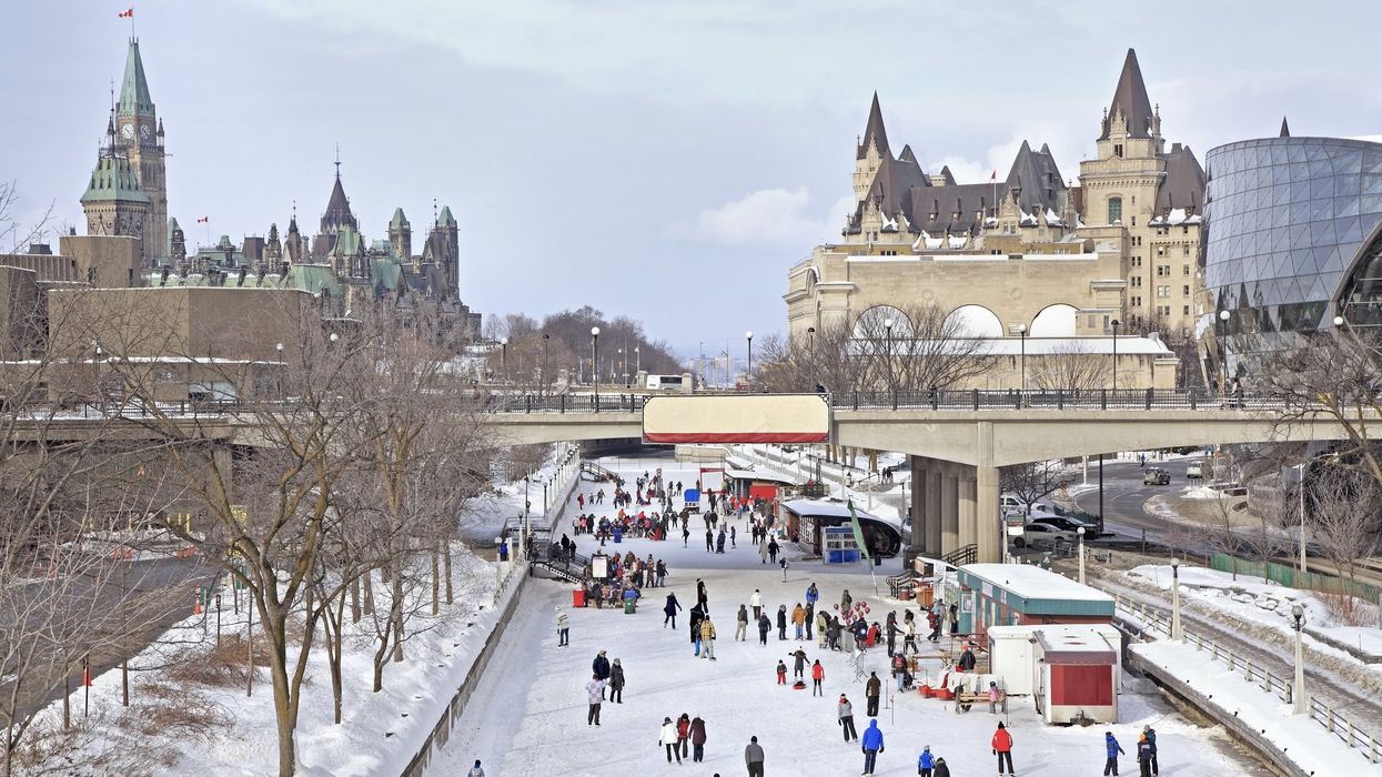People on the Rideau Canal skating rink during winter in Ottawa.