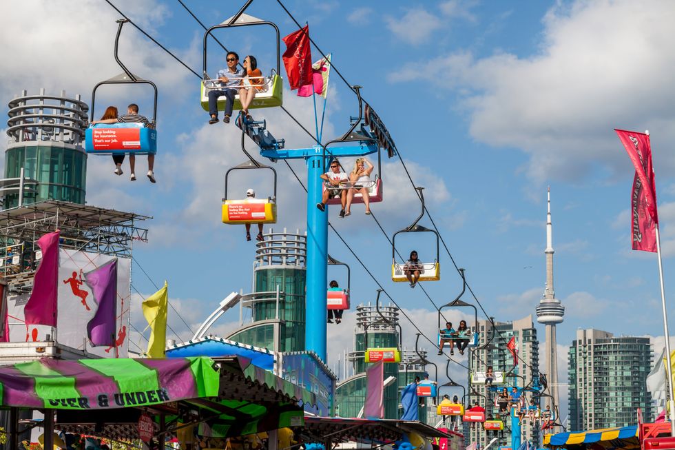 People riding the Sky Ride at the CNE on the Labour Day long weekend