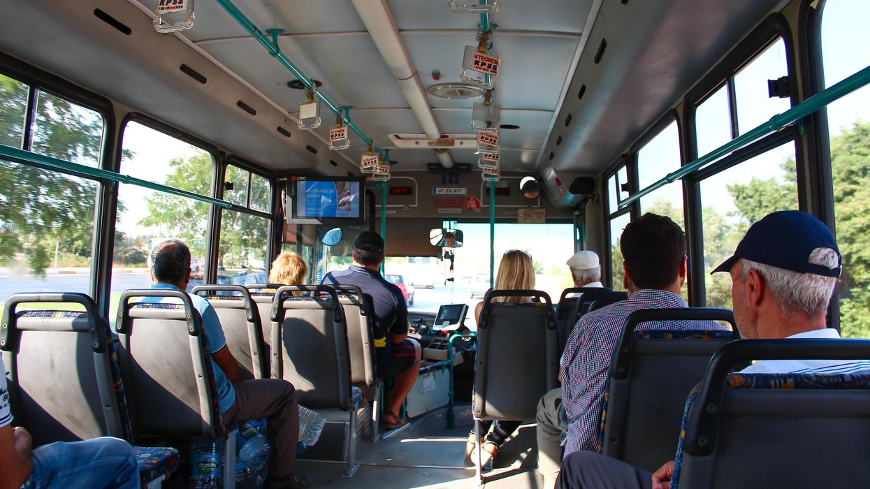 People sitting on a bus.