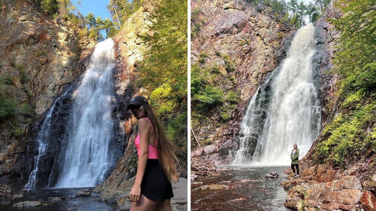People standing in front of the Fall Brook Falls waterfall in New Brunswick.