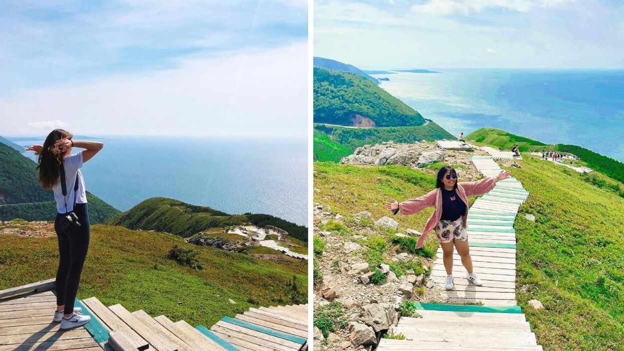 People standing on the Skyline Trail boardwalk with the mountains and ocean in the background.