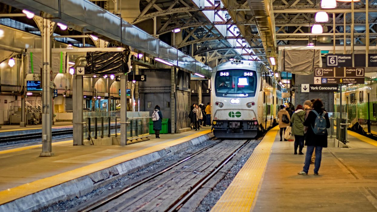 People wait to board a GO train at Toronto's Union Station.