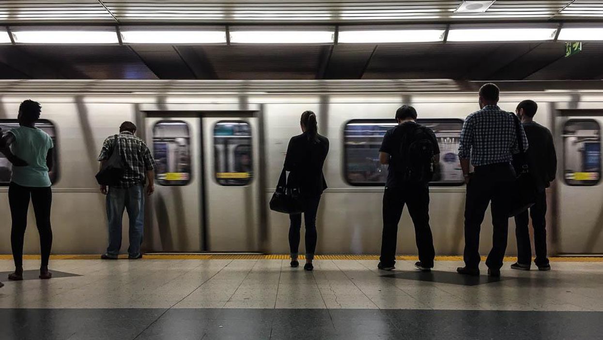 People waiting for a TTC Subway.