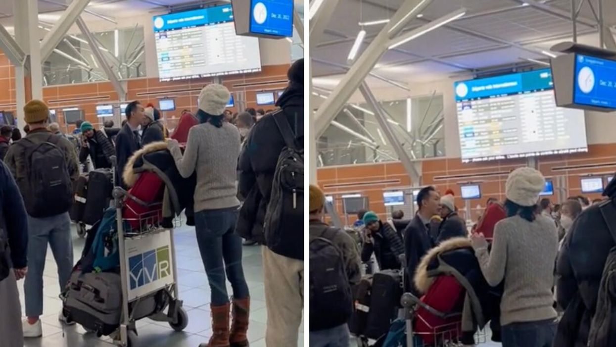 People waiting for flights at the Vancouver Airport.