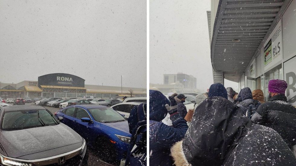 People waiting outside a BLS Centre in Toronto.