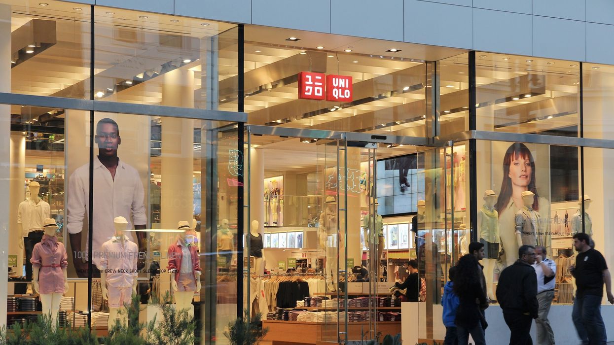 People walk by UNIQLO fashion store in San Francisco.