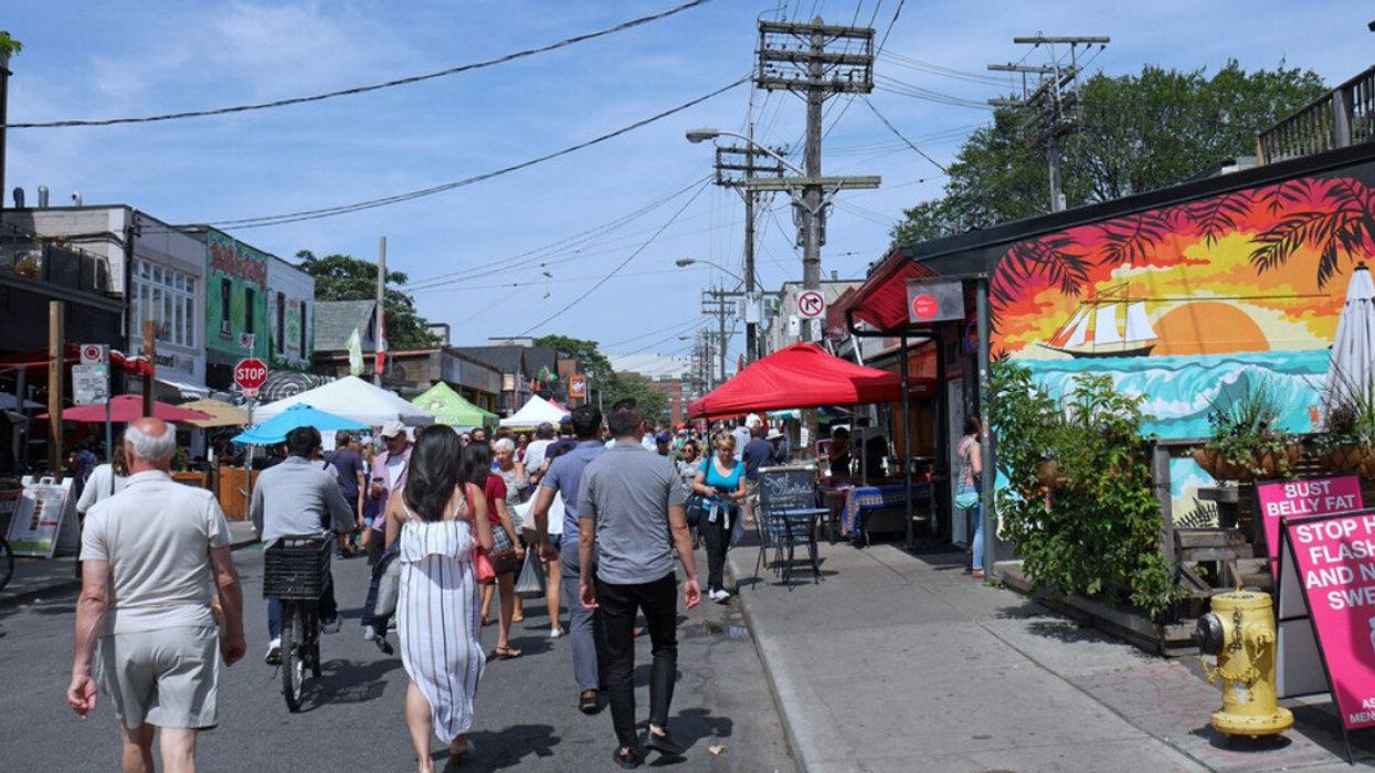 People walking along a city street.