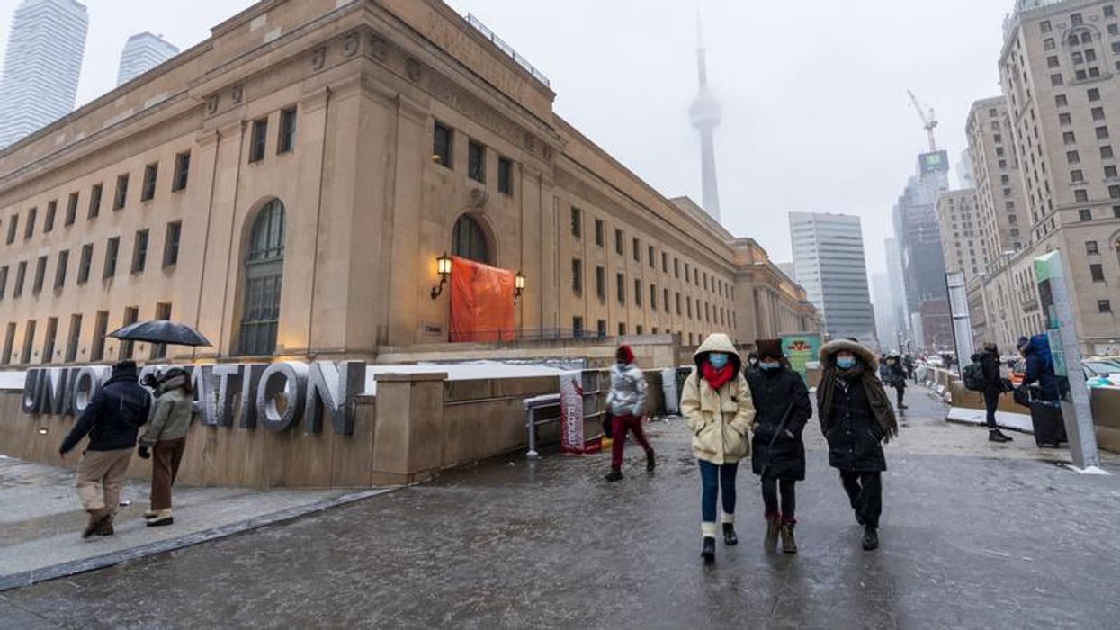 People walking outside of Toronto Union Station.