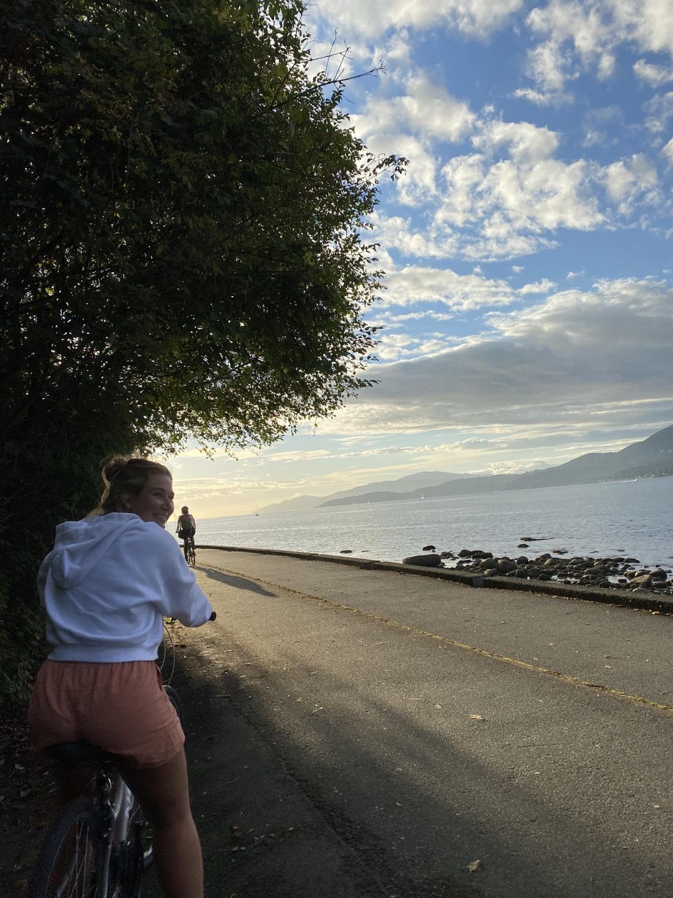 Person biking on the seawall in Vancouver.