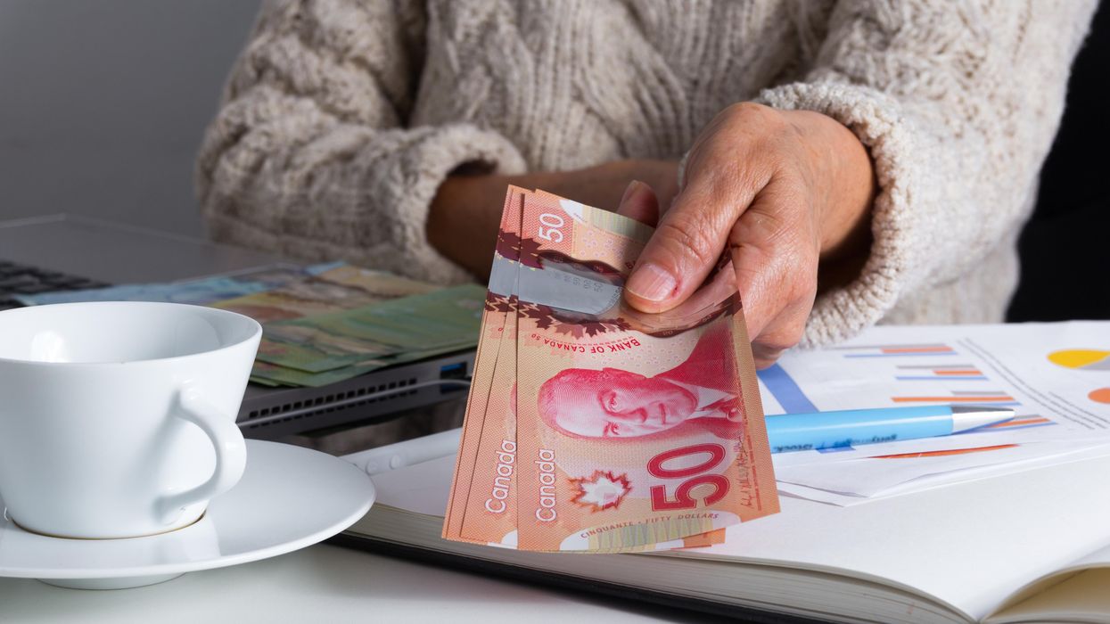 Person giving money.